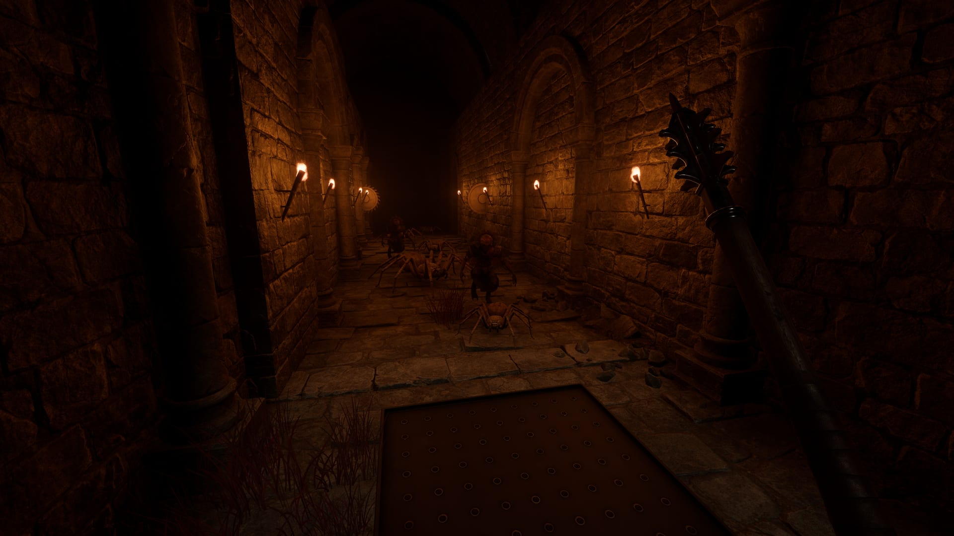 A vaulted corridor lined with burning torches, crates stacked along it and a figure at the far end